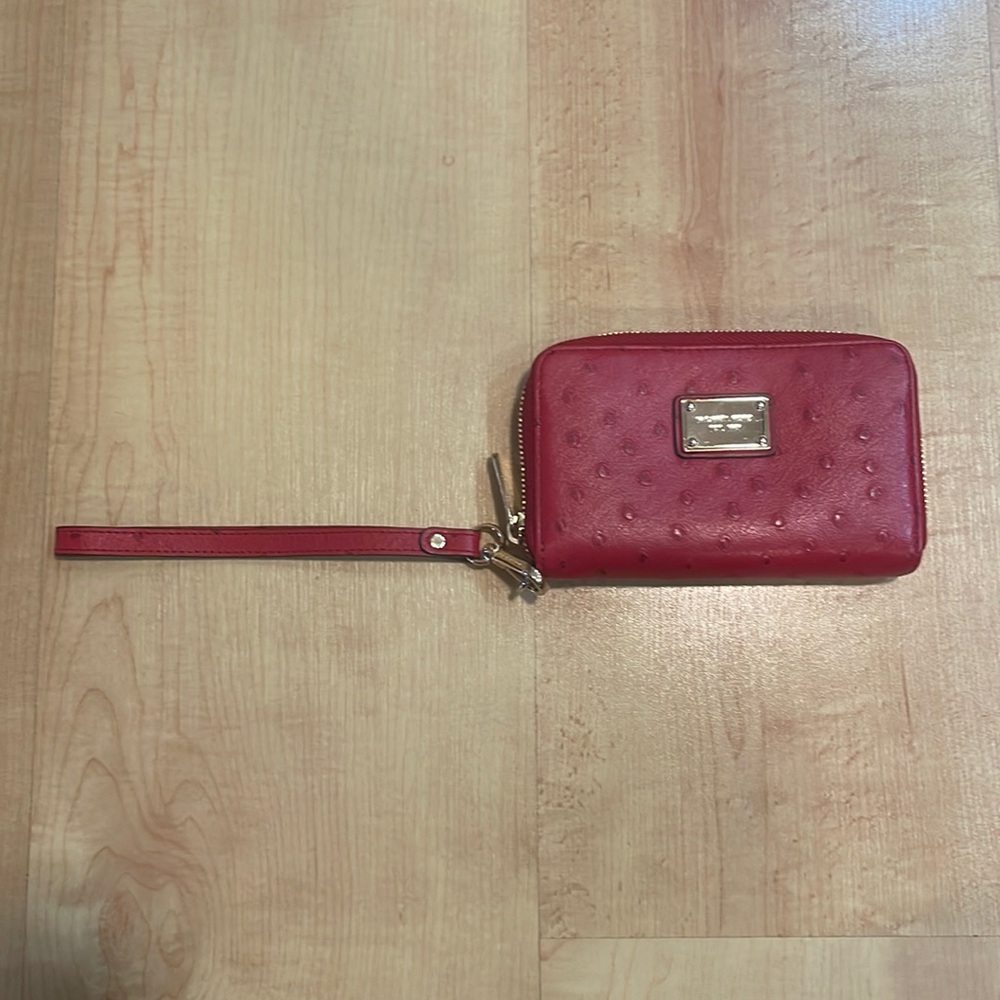 Michael Kohrs red wristlet. Like new.